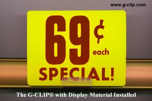 G-Clip® shelf edge sign holder with display material installed